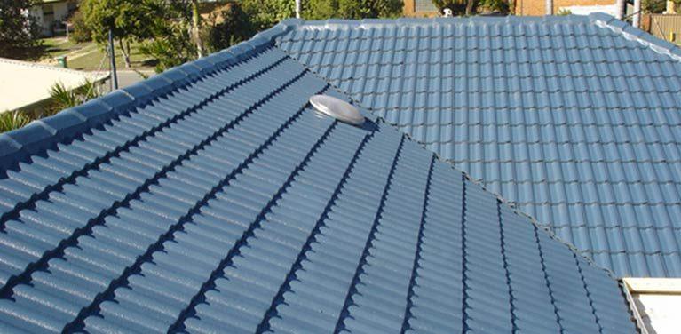 Blue-grey restored tile roof with a skylight