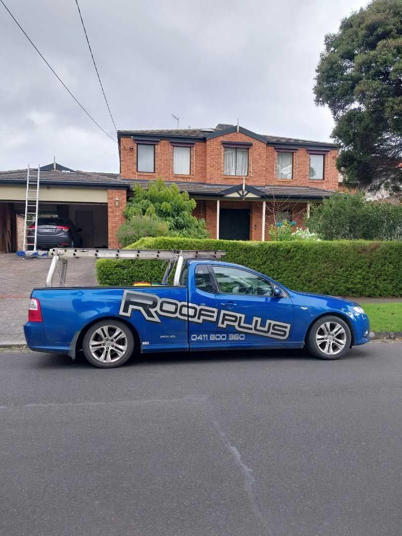 Roof Plus work ute parked outside a Melbourne home