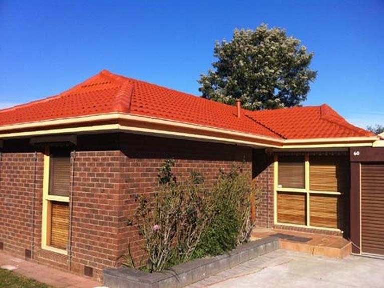 Brick home in Melbourne with a fully restored terracotta tile roof